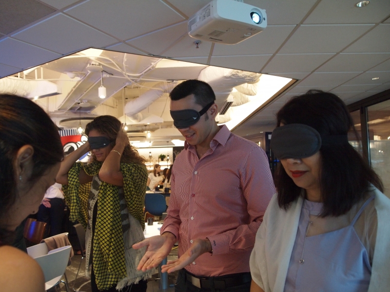 Colliers staff are blindfolded whilst participating in a sensory deprivation activity