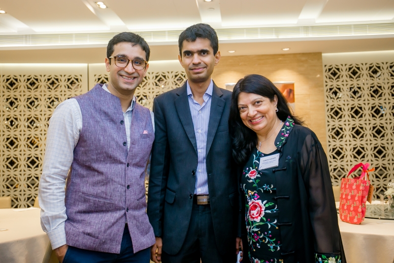 Faride Shroff with 2 event attendees in smart attire