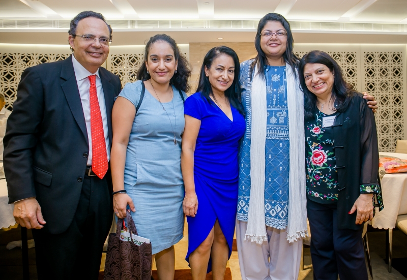 1 man with 4 woman in smart attire