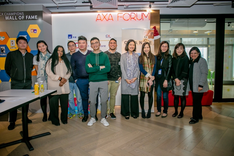 Group photo of SENsational Foundation founder Faride Shroff and AXA staff in smart attire