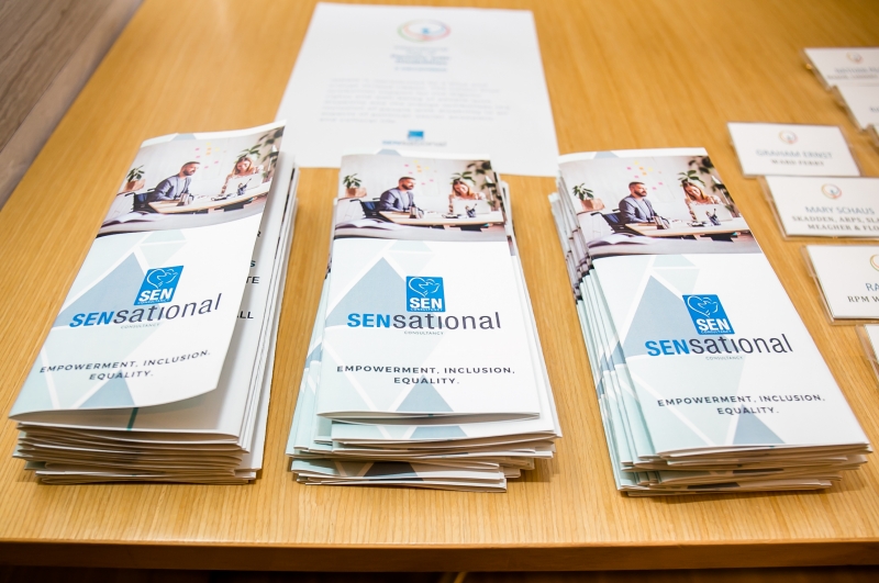 A table filled with SENsational Foundation Brochures